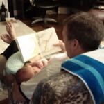Isaac's first story time with Dad