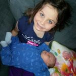 Isaac and cousin Isabelle at 1 month