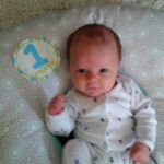 Isaac at 1 month - Ready to party!