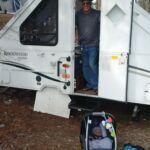 Opa in the trailer and Issac at the cottage