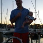 Daddy with Isaac after Thursday night sailing...racer in training