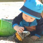 Isaac playing in the sand
