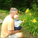 Isaac loved the flowers around Oma and Opa's property