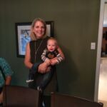 Magic Sam calms Isaac down before bed.