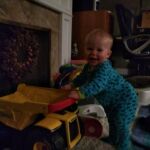 Isaac can always spot the newest toy in the room, a gift from cousins Bonnie and Mike