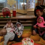 Isaac escaping the photo shoot! Or running away from the girls (Elena, Jean, and Iza held by Zuza)