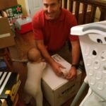 Helping Daddy pack...