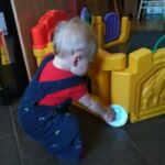 Isaac kept finding the 8 month sticker...