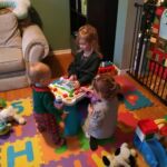 Lyla and Finley playing with Isaac