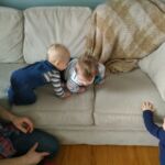 lunch club boys wrestling on the couch