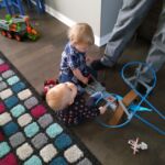 Playing with firend Wesley at a birthday party