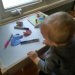 helping to make valentines for the party