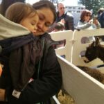 Anna and Elise at the sugar bush petting zoo