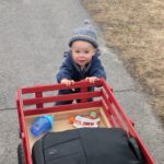 Isaac loves to push his wagon!