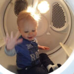 Isaac's new favourite toy...the dryer!