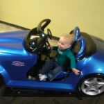 Look Papa! Isaac likes convertibles too!