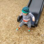 Isaac loves slides!