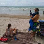 Nap cuddles on the beach