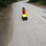 Isaac loves his dump truck