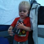 Hanging out in the tent...with Daddy's beer