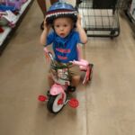 trying on helmets and bikes as Walmart on the way home from Sandbanks
