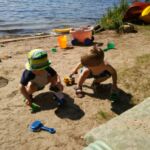 Isaac and Iden playing with trucks