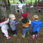 Elyse, Isaac, Hank, and Inez at Bunnyville in Saunders Farm