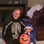 Isaac loved opening the door for the kids trick or treating
