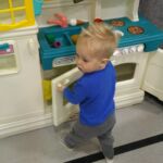 Isaac loves to help cook, and play kitchen