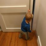 Isaac loved helping daddy build the bedroom door, and continues to "fix" it now that it's done