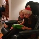 cousin Charlotte reading to Isaac