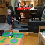 Isaac helping daddy fix the chairs