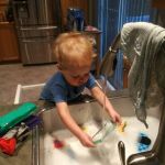 Still loves doing the dishes, so I let him wash his toys