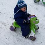 riding down the hill at daycare