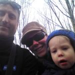 Riding the tractor at the sugar bush