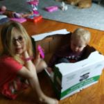 Lyla and Isaac playing with a calculator