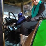driving the tractor at the experimental farm