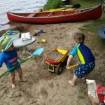 Isaac and Iden filling the dump truck