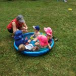 Slippery fish, swimming in the water...
Dan's mom entertaining the kids at the cottage