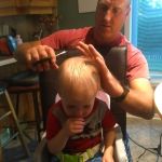 Lollipop to keep Isaac still while getting his hair cut