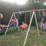 Mat and Iden, Jon and Isaac playing on our new swing set