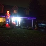 Isaac trick or treating to the Spiderman house