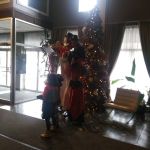 Musicians on stilts at the OPS holiday party
