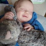 smiling in his sleep