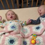 After bath playtime in the crib