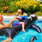 whale ride in Glenna's pool