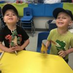 both wearing dinosaur shirts!