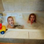 Isaac and Inez in the cottage tub
