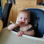 it almost looks like he's eating with a spoon...oh except for all the food on his face