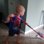 new favourite toy - "mom, can I please mop?"
